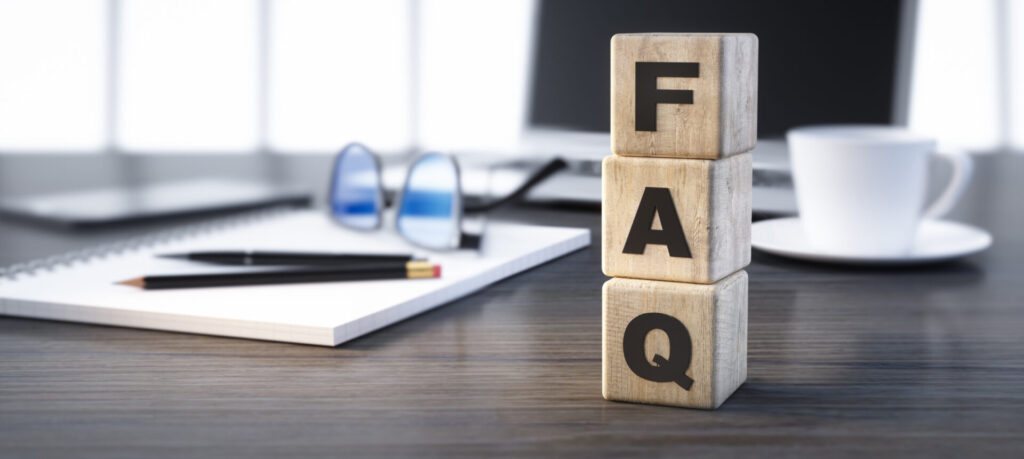 FAQ letters on wooden blocks